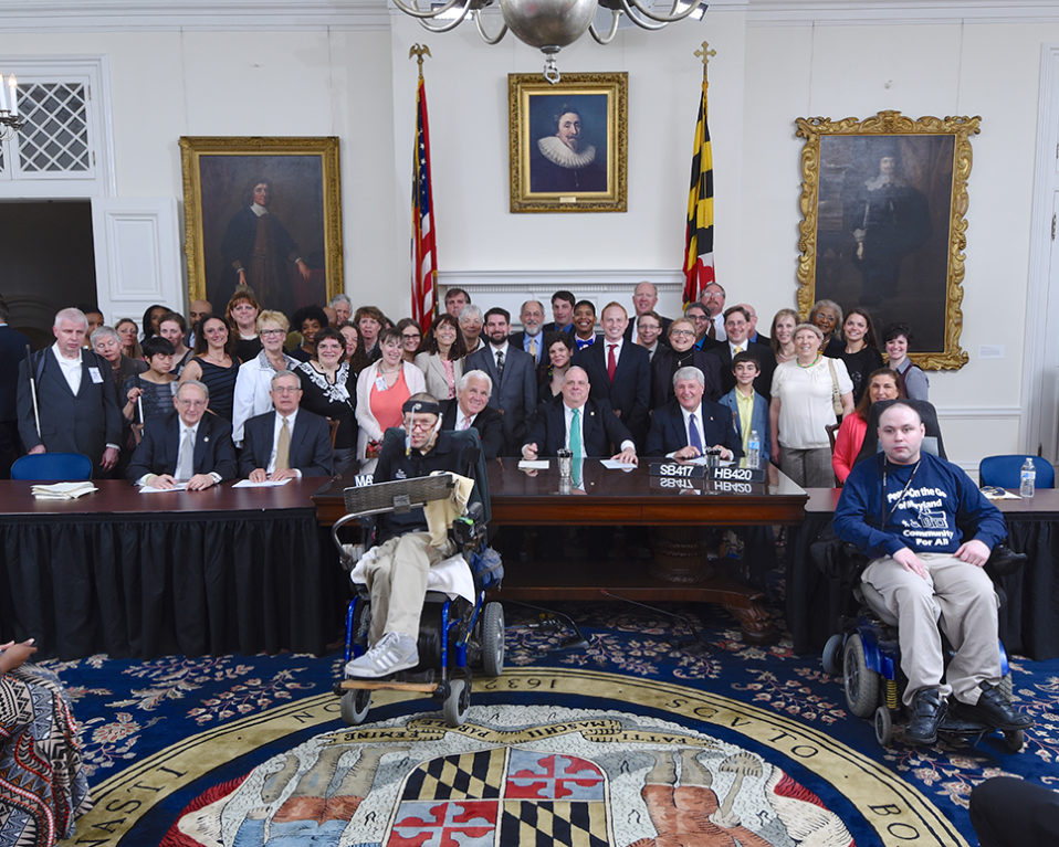 Group photograph of many people in Maryland statehouse for SB-417-HB-420