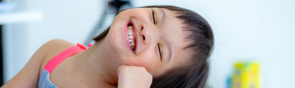 Toddler Smiling big with thumbs up