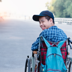 Student in wheelchair smiling